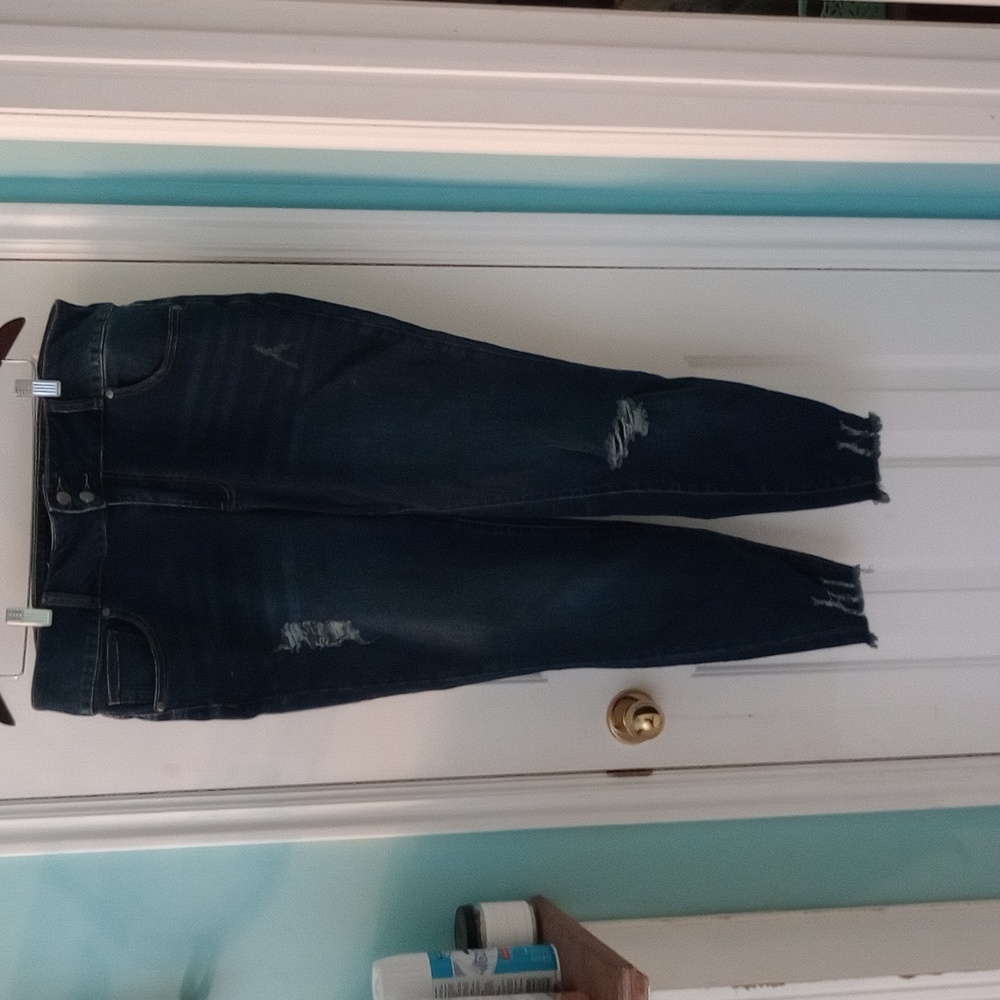 Dark blue jeans. Has stretchy material.